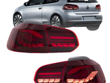 Tail lights are displayed, showing a sleek red design, set against a background image of a silver hatchback car with visible brand and model logos.