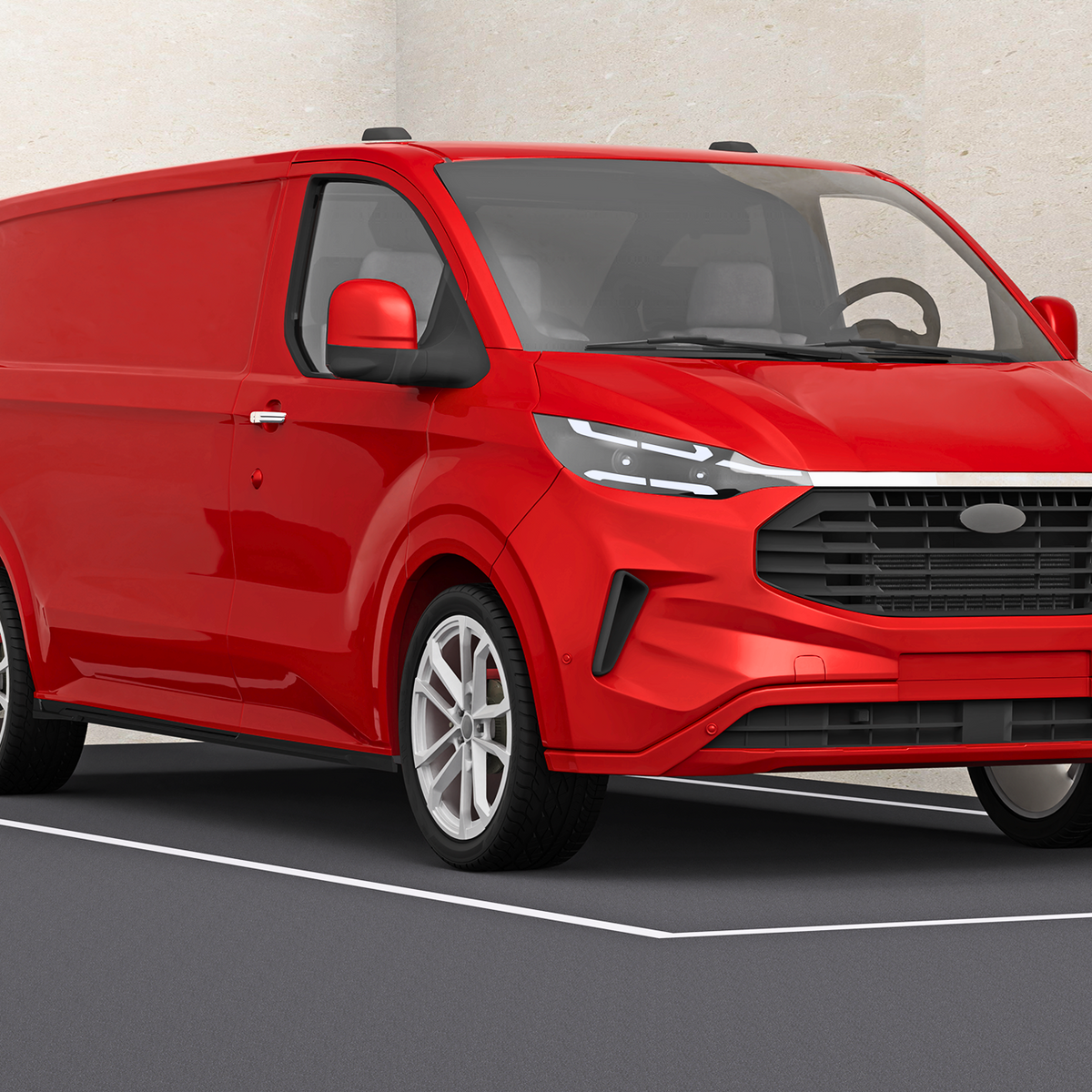 A red cargo van is parked in an indoor setting, featuring modern headlights and a prominent front grille. The light-colored walls provide a neutral backdrop.