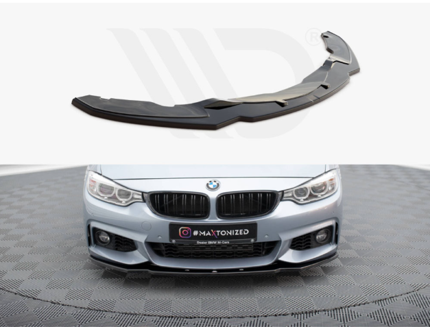 A black car front lip spoiler is displayed separately above the front view of a silver BMW, which has the spoiler installed. The car is on a textured, patterned floor. The text reads: "#MAXTONIZED."