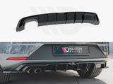 A black car rear diffuser is shown, unattached in the upper image. The lower image shows the diffuser installed on a car bumper with the text 