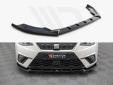 A black car front lip spoiler sits alone above a close-up of a white car's front bumper fitted with the spoiler. Text: 