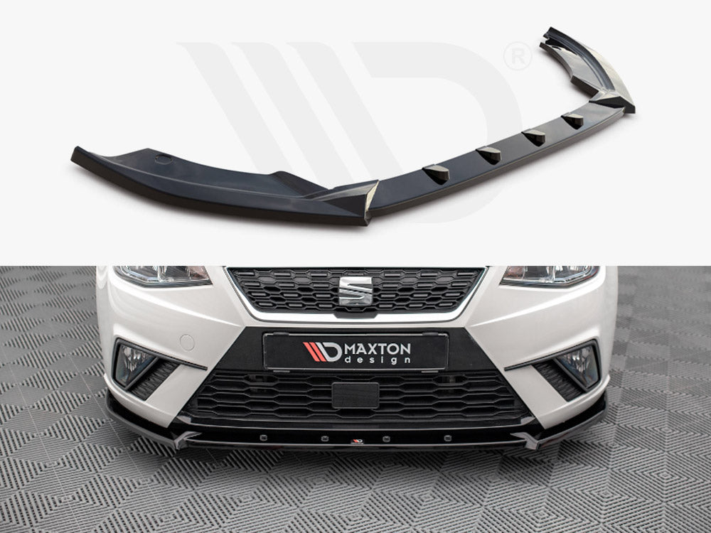 A black car front lip spoiler sits alone above a close-up of a white car's front bumper fitted with the spoiler. Text: "MAXTON design" on the license plate area.