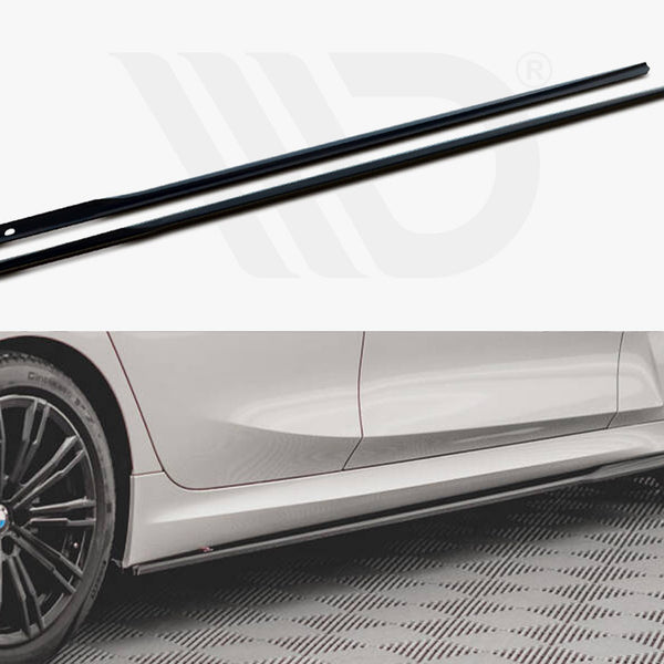 Two slim black car side skirts lie parallel on a white surface. Below, a white car with black alloy wheels displays the skirts attached, set on a patterned floor.