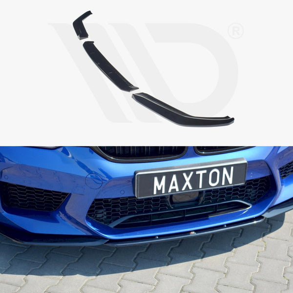 Car splitter attached to the front bumper of a blue vehicle parked on a gray cobblestone surface. Text on the license plate reads “MAXTON.”