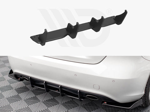 A black car diffuser, consisting of multiple fins, appears in two views: a close-up of the diffuser and its installation on the rear bumper of a white car on a checkered floor.