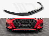 A black car front splitter, designed for aerodynamics, is showcased above a red Audi with a black grille. Below, text reads 