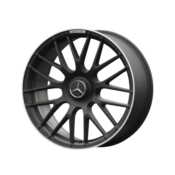 A black, multi-spoke car wheel rim features a Mercedes logo at its center, with "AMG" inscribed along the rim. It is displayed on a plain white background.