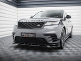 A gray Range Rover is parked in a geometric-patterned room, showcasing a customized front bumper. The license plate reads 