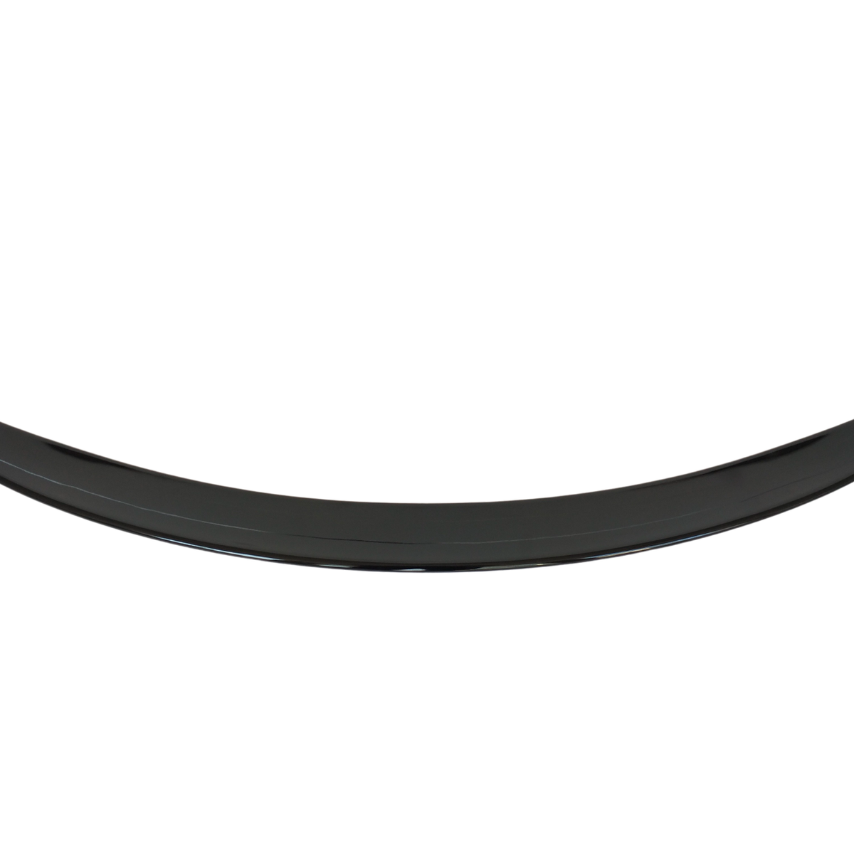A black, crescent-shaped object curves upward, possibly a car spoiler, set against a plain white background.