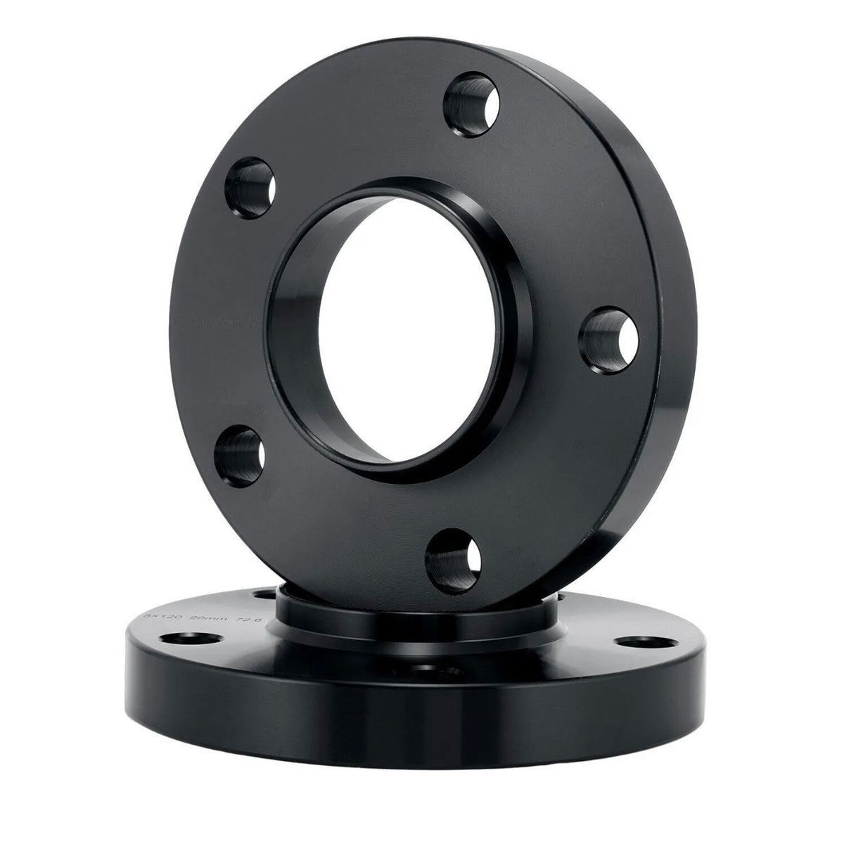 A black metal flange with circular holes is positioned upright, next to a similar flange lying flat. The surrounding background is plain and white, highlighting the objects.