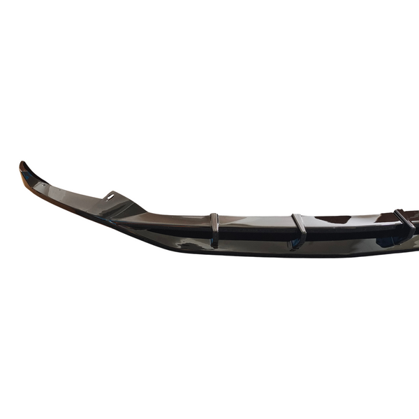 A glossy black car bumper with aerodynamic fins, curving slightly upward at the ends, isolated on a white background.