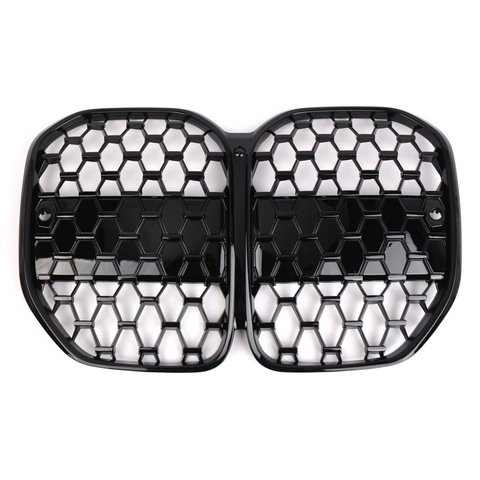 A black, honeycomb-patterned, dual-section car grille with a glossy finish lies against a plain white background, designed for automotive front-end ventilation and style enhancement.