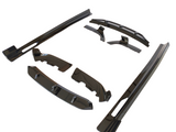 Black plastic car body kit components are arranged on a plain white background, showcasing various aerodynamic parts for vehicle customization.