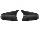 Two carbon fiber side mirror covers are placed symmetrically, angled towards each other, against a plain white background, highlighting their sleek, aerodynamic design and glossy texture.
