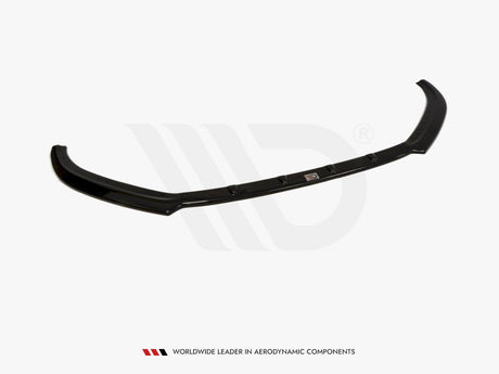 A black car spoiler is displayed on a plain white background, featuring a logo in the center. Text below reads, "WORLDWIDE LEADER IN AERODYNAMIC COMPONENTS."