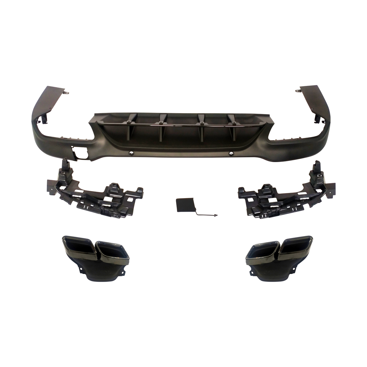 Car bumper components are laid out separately; a large central section with cutouts, two plastic grilles, and twin exhaust tips, arranged on a plain white background.