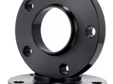 Two black circular flanges with bolt holes sit stacked, one atop the other. Text on the bottom flange reads “H8-100 P3.0.” The background is plain white.