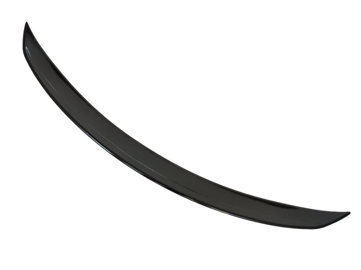 A sleek, black car spoiler curves gracefully, isolated against a white background, showcasing its aerodynamic design.