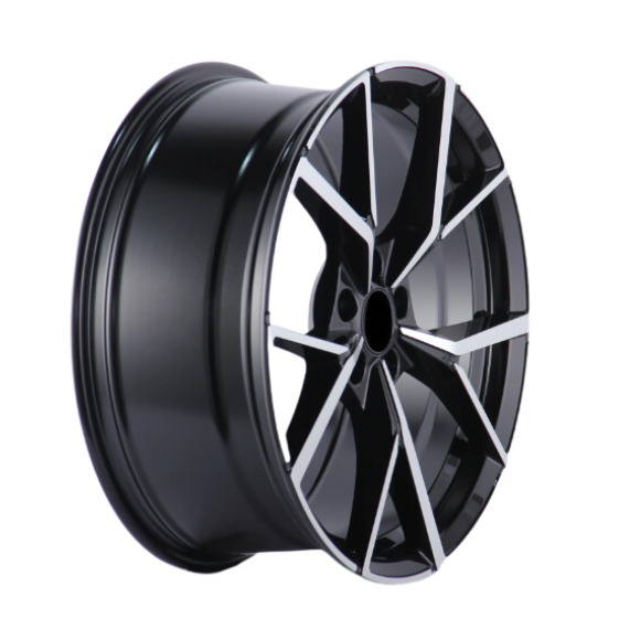 A glossy, black alloy wheel with intricate, angular spokes is shown against a plain white background.