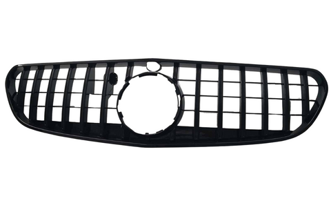 A black car grille features vertical and horizontal slats forming a rectangular pattern, with a circular opening in the center, set against a plain white background.