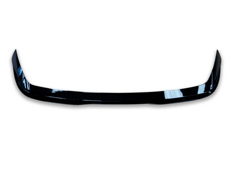 A glossy black car spoiler, curving slightly upward at each end, isolated on a plain white background.