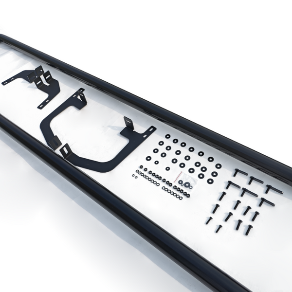 Various black metal brackets and screws arranged neatly on a white surface. Two long black rails frame the array, creating an organized presentation of hardware components.