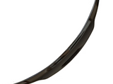 A glossy, curved, black car spoiler displayed against a plain white background. The object is cleanly silhouetted, showcasing its streamlined design.