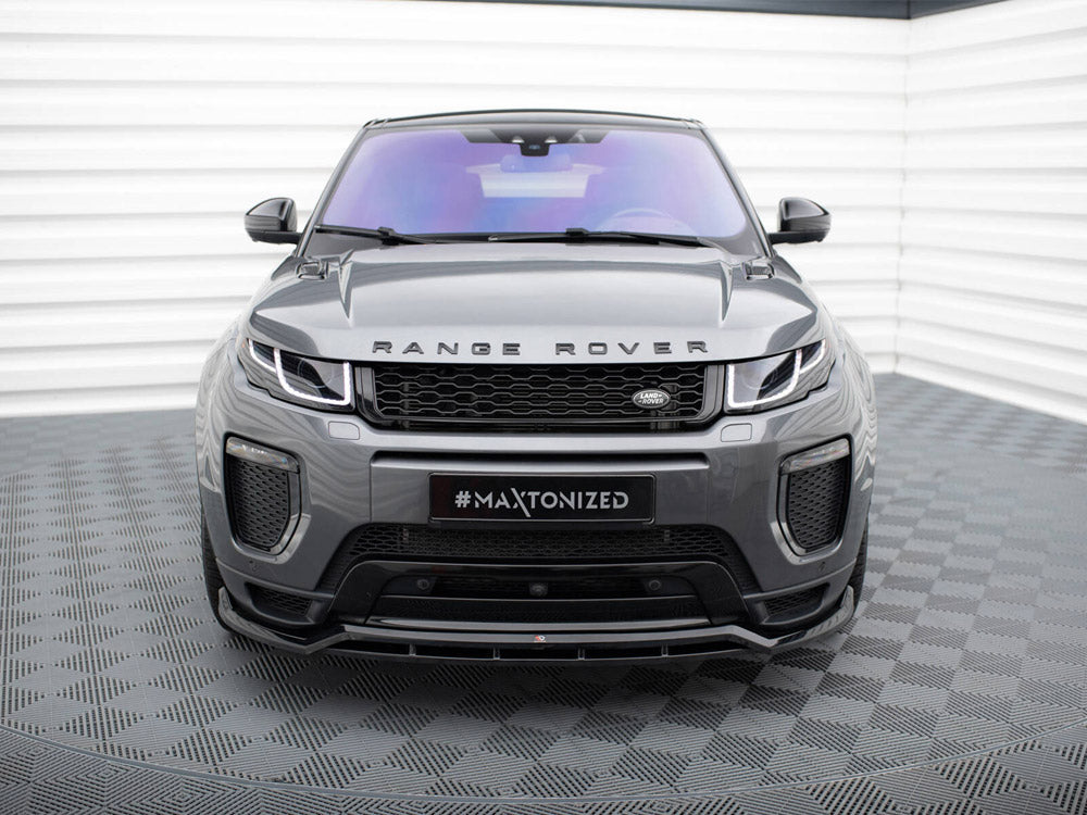 A gray Range Rover with sleek headlights faces forward, parked on a tiled floor. The text "RANGE ROVER" is on the hood and "#MAXTONIZED" on the front plate.