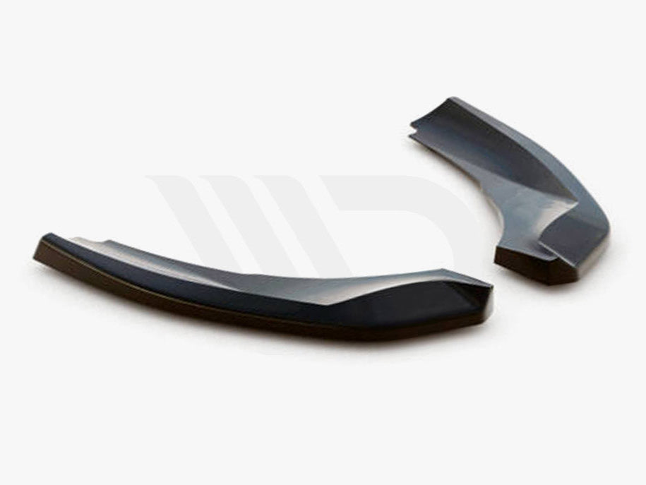 Two sleek, black aerodynamic components rest on a light background. Small text below reads, "WORLDWIDE LEADER IN AERODYNAMIC COMPONENTS."