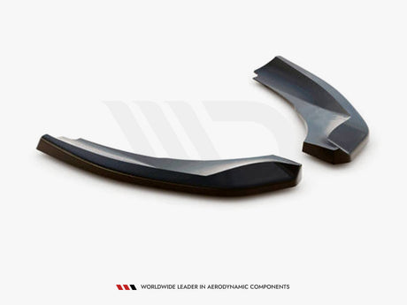 Two sleek, black aerodynamic components rest on a light background. Small text below reads, "WORLDWIDE LEADER IN AERODYNAMIC COMPONENTS."