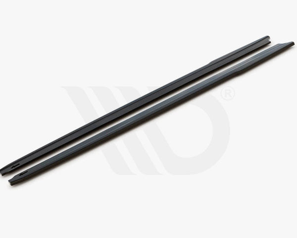 Two long, slim black bars rest parallel on a white surface. Text reads: "WORLDWIDE LEADER IN AERODYNAMIC COMPONENTS."