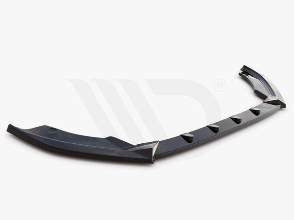 A sleek, black aerodynamic car bumper spoiler sits against a plain background. Below it, the text reads, "WORLDWIDE LEADER IN AERODYNAMIC COMPONENTS."