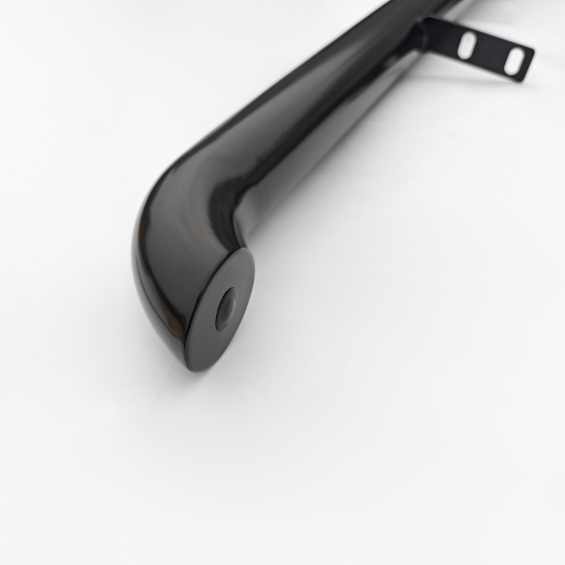 A glossy black metal pipe with a curved end and two mounting brackets protrudes on a plain white background.