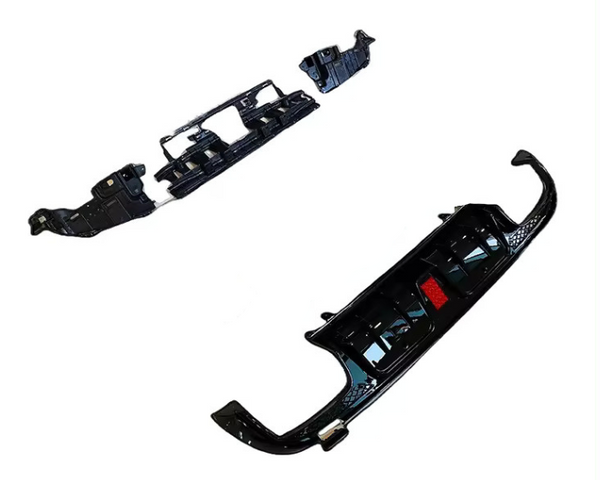 Black car bumpers are laid out separately on a plain white background, showcasing their curved and angular design features.