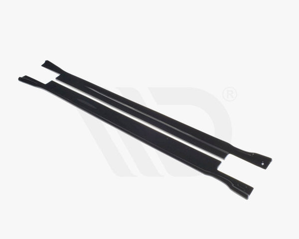 Two sleek, black aerodynamic components lie parallel to each other against a white background. Text at the bottom reads: "WORLDWIDE LEADER IN AERODYNAMIC COMPONENTS."