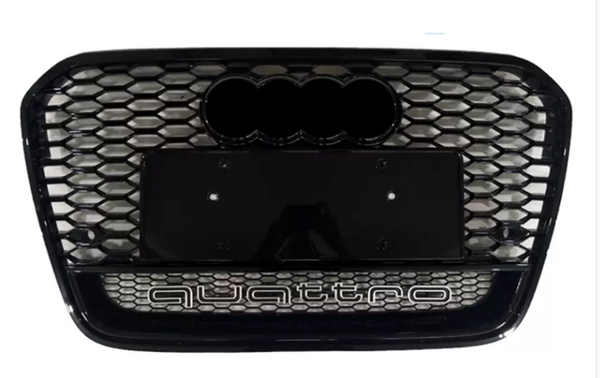 A black honeycomb car grille with four rings and the word "quattro" below, set against a white background.