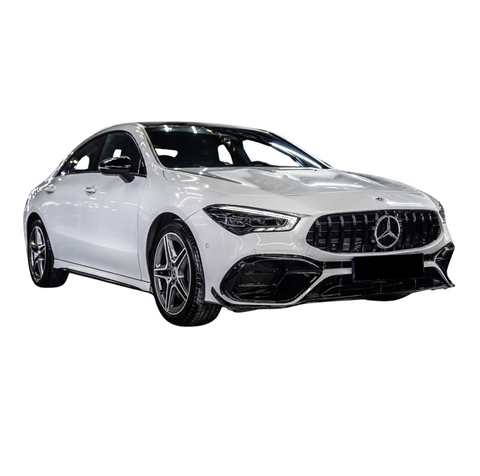 A white sedan with a prominent front grille and sleek design, positioned on a white background, highlighting its modern, sporty style.