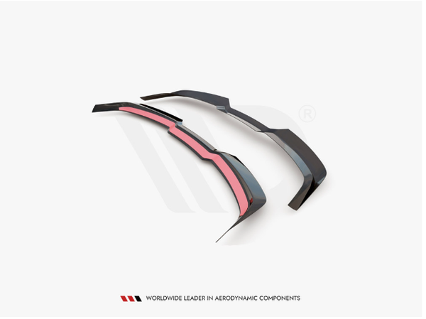Two dark aerodynamic car components with red accents lay side by side. Text below reads: "WORLDWIDE LEADER IN AERODYNAMIC COMPONENTS." The background is plain white.
