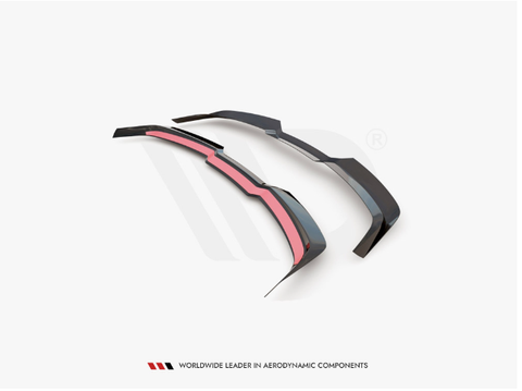 Two dark aerodynamic car components with red accents lay side by side. Text below reads: "WORLDWIDE LEADER IN AERODYNAMIC COMPONENTS." The background is plain white.