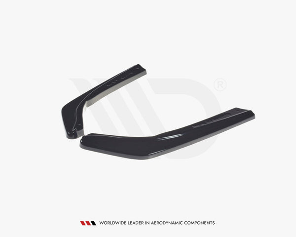 Black aerodynamic components rest on a white background. Below them, text reads, “WORLDWIDE LEADER IN AERODYNAMIC COMPONENTS.”