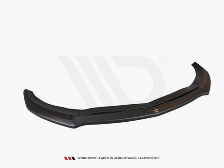 A sleek, black car front lip spoiler rests on a plain white background. Text beneath reads: "WORLDWIDE LEADER IN AERODYNAMIC COMPONENTS."