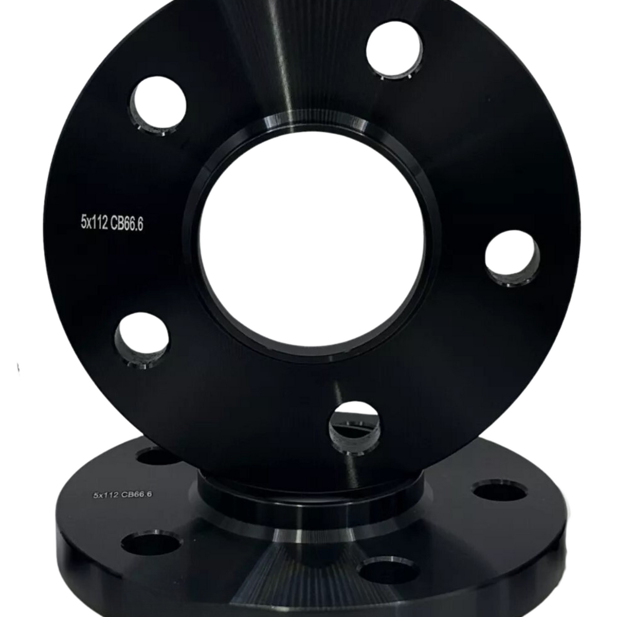 Two black wheel spacers, each with multiple holes, are stacked vertically. The top spacer displays the text "5x112 CB66.6" on a plain white background.
