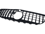 A black, rectangular car grille with a grid pattern and a circular opening in the center, set against a plain white background.