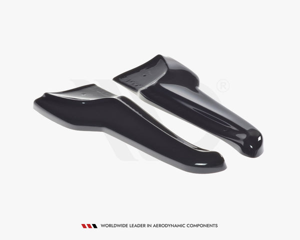 Two glossy black aerodynamic components are positioned side by side on a white background. Text at the bottom reads: "WORLDWIDE LEADER IN AERODYNAMIC COMPONENTS."