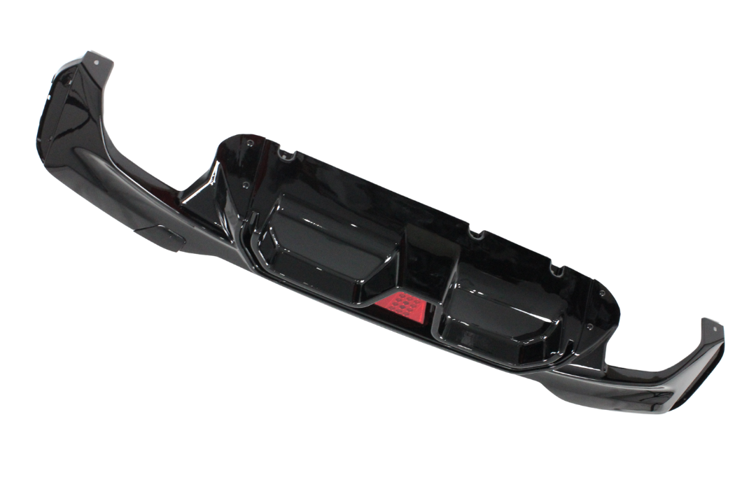 A glossy black car bumper with aerodynamic contours and a central red reflector, displayed against a white background.