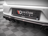 A car bumper features a license plate that reads 