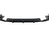 A black car bumper diffuser with aerodynamic fins is laid flat, designed for vehicle aerodynamics, against a plain white background.