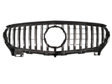 Chrome vehicle grille with vertical slats and a central circular emblem space, resting on a plain white background, displaying a sleek and modern design.