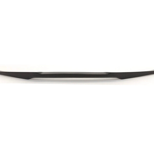 A long, sleek, black object, possibly an automotive accessory or trim piece, lies horizontally against a plain white background.