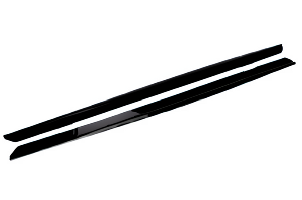 Two long, thin, black objects appear parallel and feature smooth surfaces, likely car side skirts, isolated on a white background with no text present.